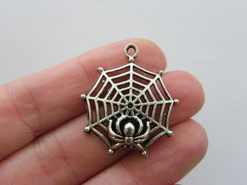 4 Spider in a spiderweb charms antique silver tone HC63