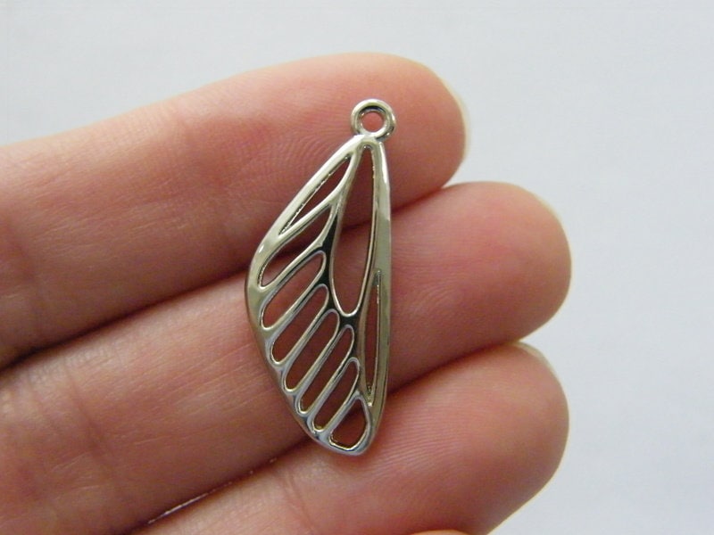8 Dragonfly wing charms antique silver tone A109