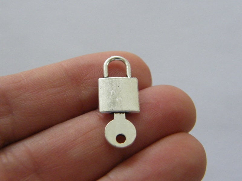 BULK 50 Lock and key charms antique silver tone K6