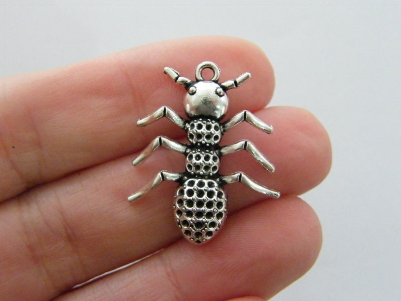 4 Ant pendants antique silver tone A267