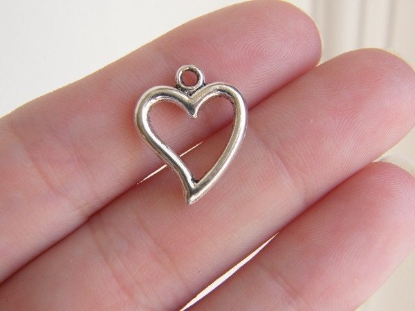 10 Heart charms antique silver tone H1