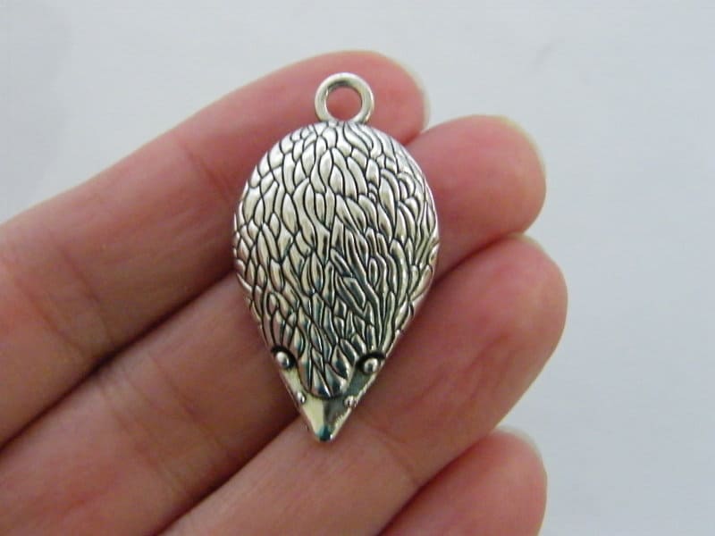 4 Hedgehog charms antique silver tone A403