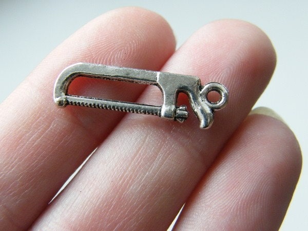 BULK 50 Hack saw tool charms antique silver tone P595 - SALE 50% OFF