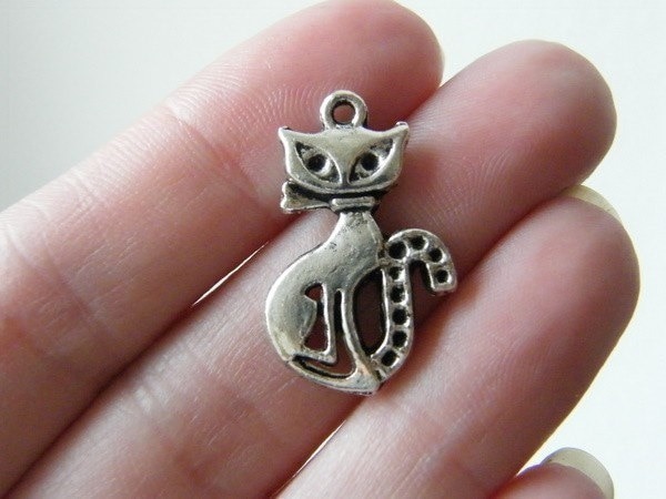 8 Cat charms antique silver tone A865