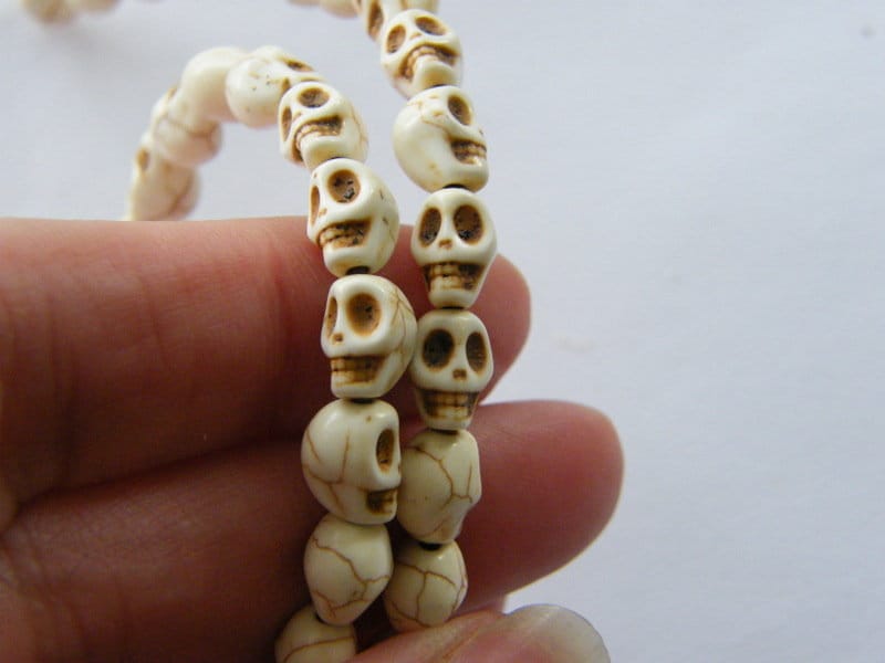 48 Off white skull beads 8 x 6mm SK27