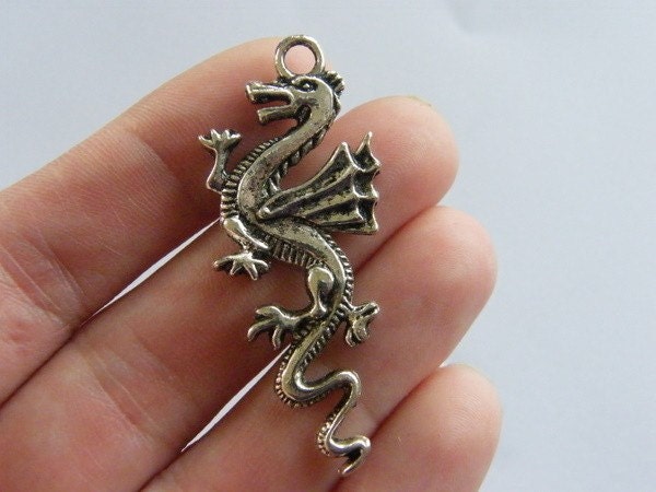 4 Dragon pendants antique silver tone A73