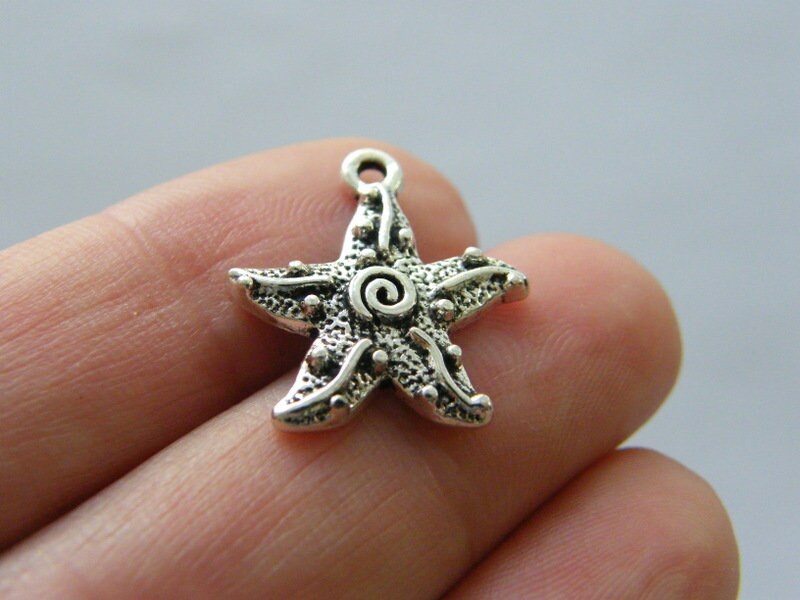 8 Starfish charms antique silver tone FF204