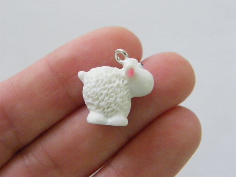 4 Sheep charms white resin A1114