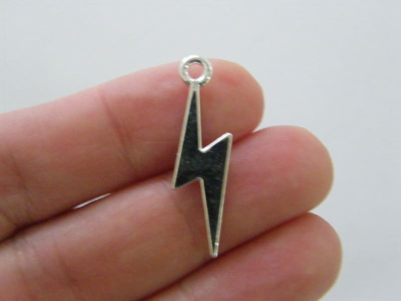 8 Lightning bolt charms silver plated tone S100