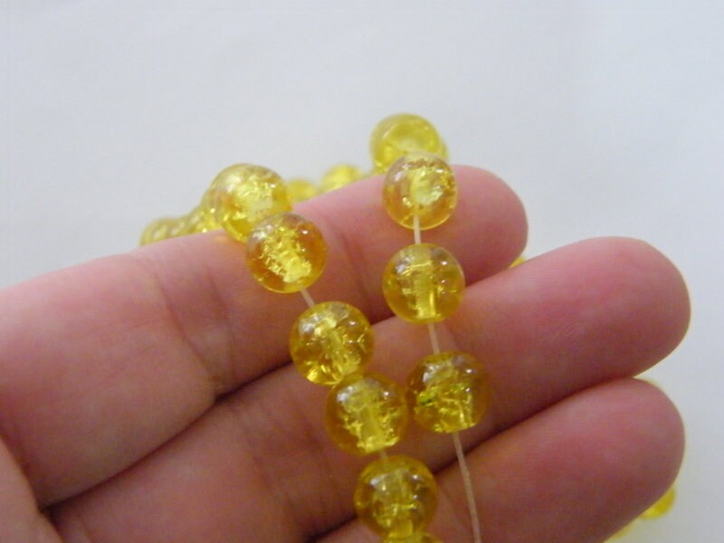 100 Yellow crackle glass beads B202