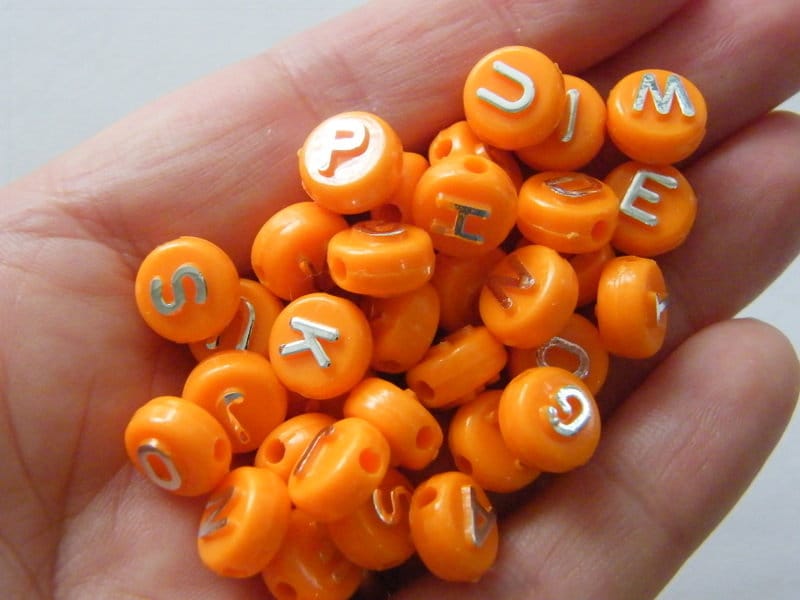 100 Acrylic alphabet 10mm letter orange and silver RANDOM beads BB464
