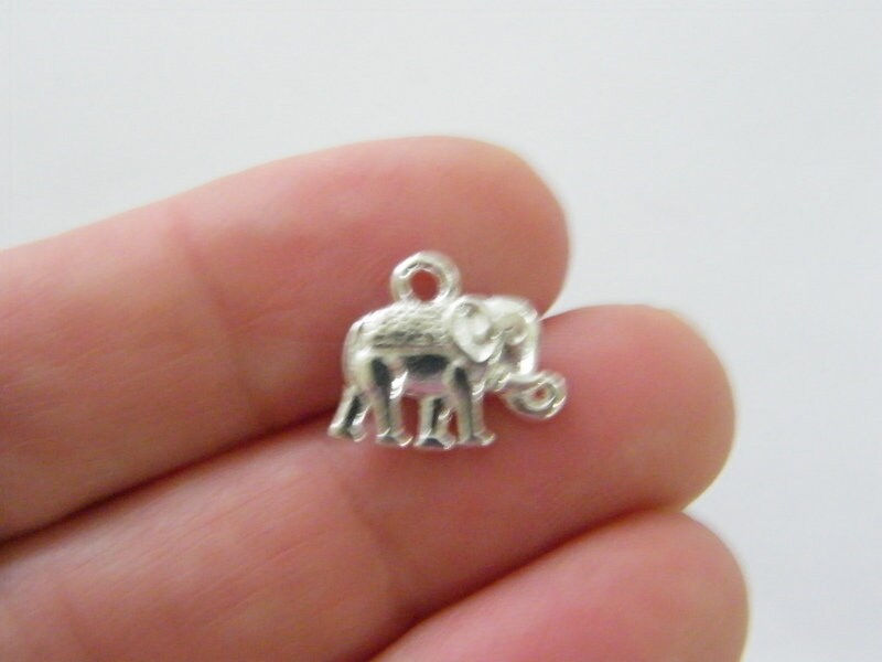 10 Elephant charms silver plated tone A1128