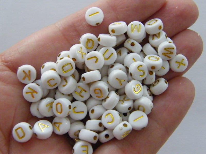 100 Letter beads white and gold RANDOM beads AB101