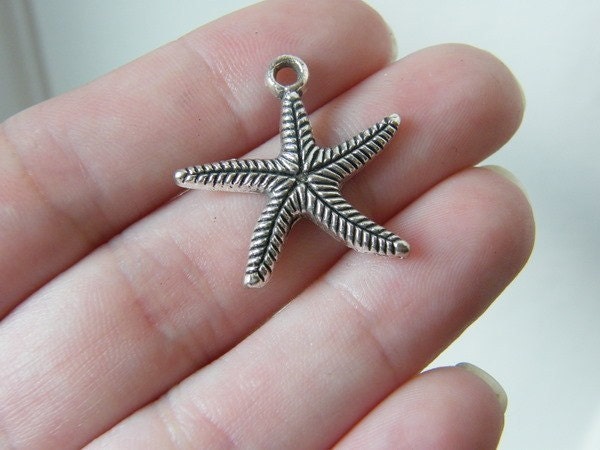 8 Starfish charms tibetan silver FF206
