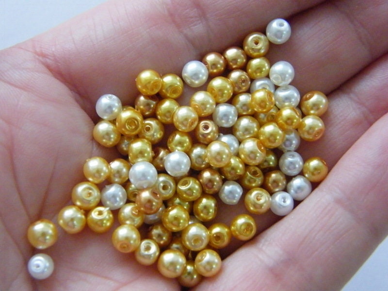 140 Sunshine beads mixed 4mm glass AB164
