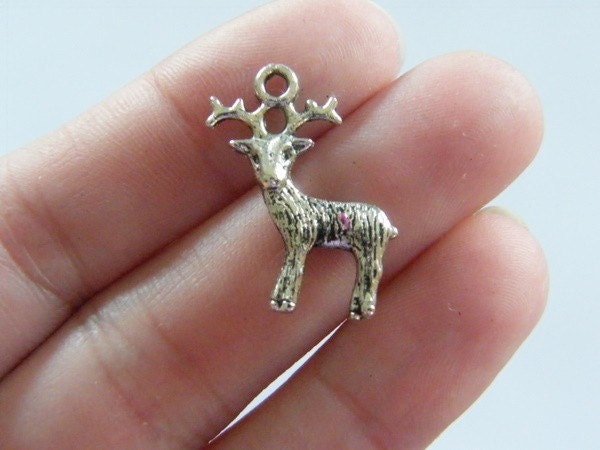 8 Reindeer charms antique silver tone CT26