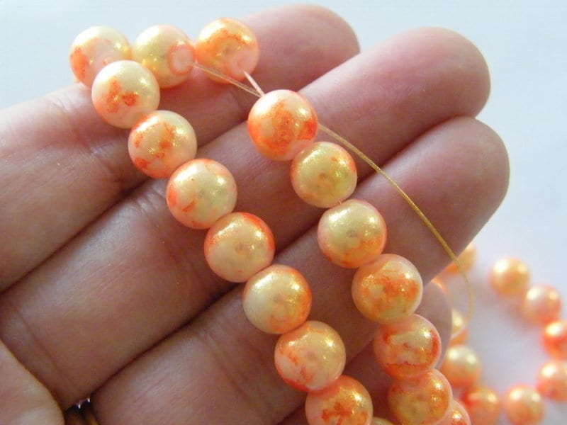 95 Gold and orange glitter beads glass B186