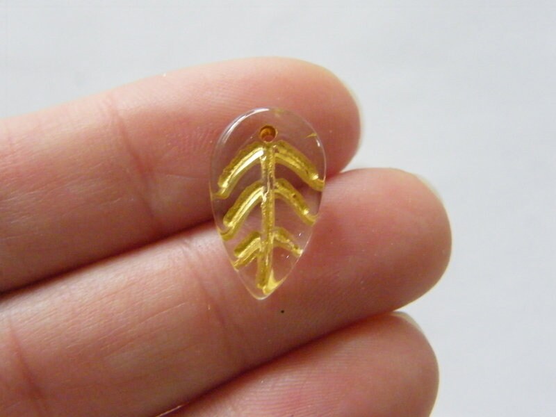 12 Leaf charms clear and gold glass L169