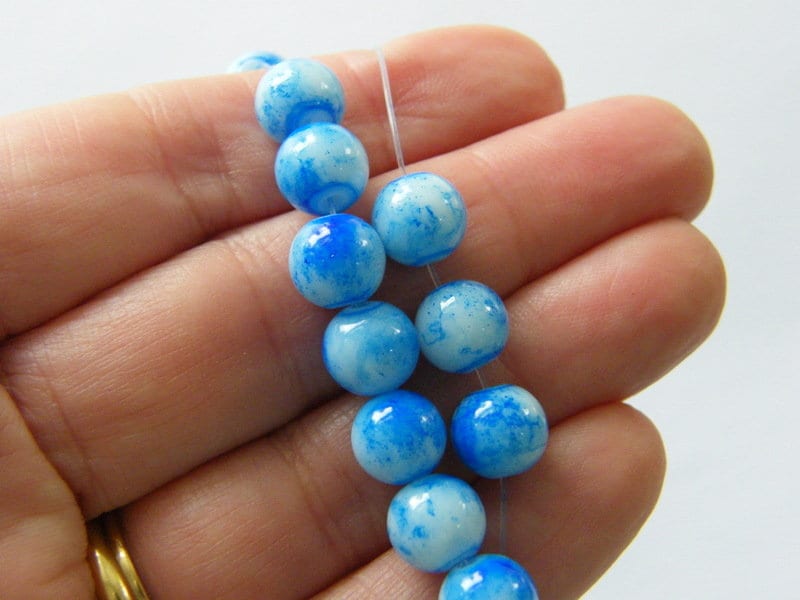 100 Dark blue and white mottled 8mm beads glass B185