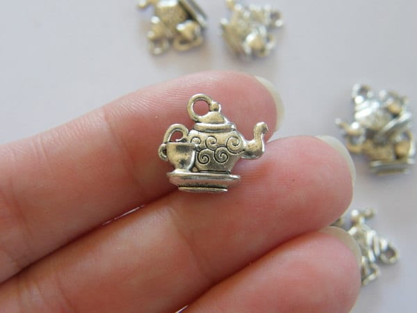8 Teapot and teacup charms antique silver tone FD54
