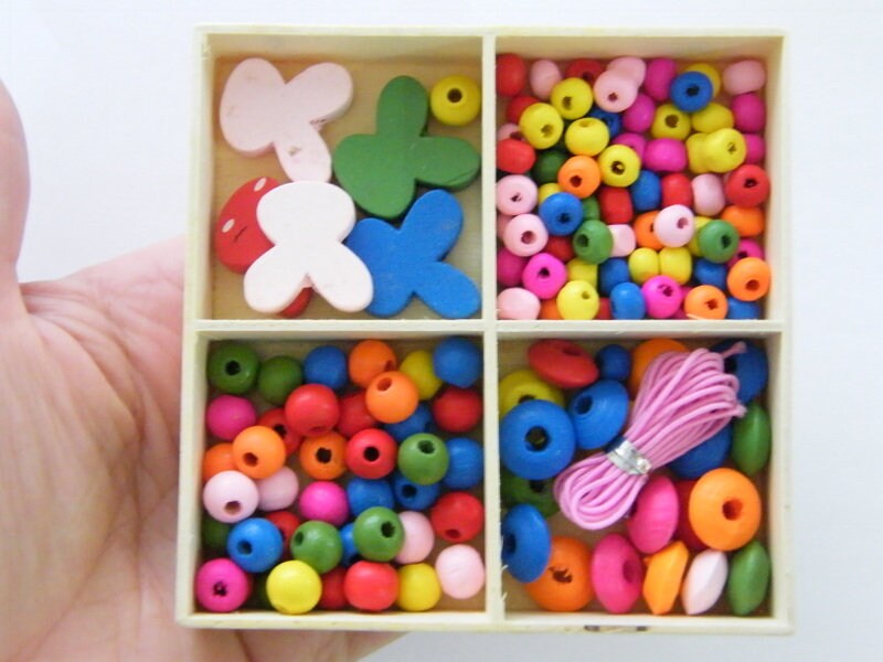 1 Box rabbit and assorted spacer beads wood