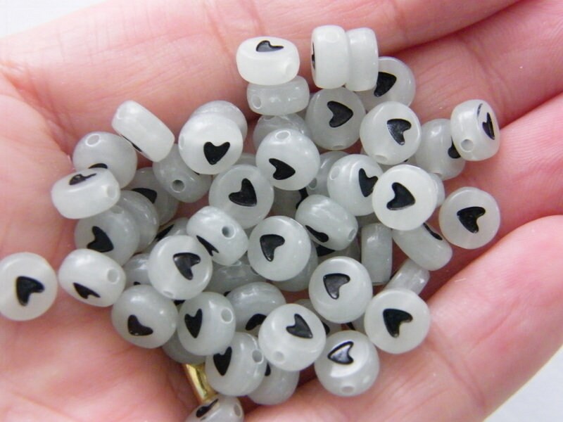 100 Glow in the dark heart beads black acrylic AB38  - SALE 50% OFF