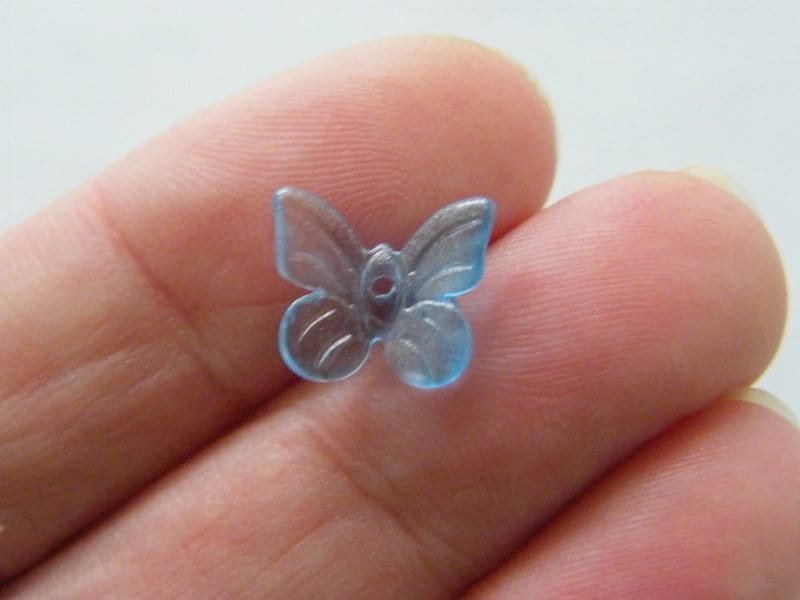14 Butterfly beads blue glass A906