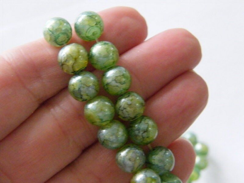 95 Shades of green a hint of white beads 8mm glass B190
