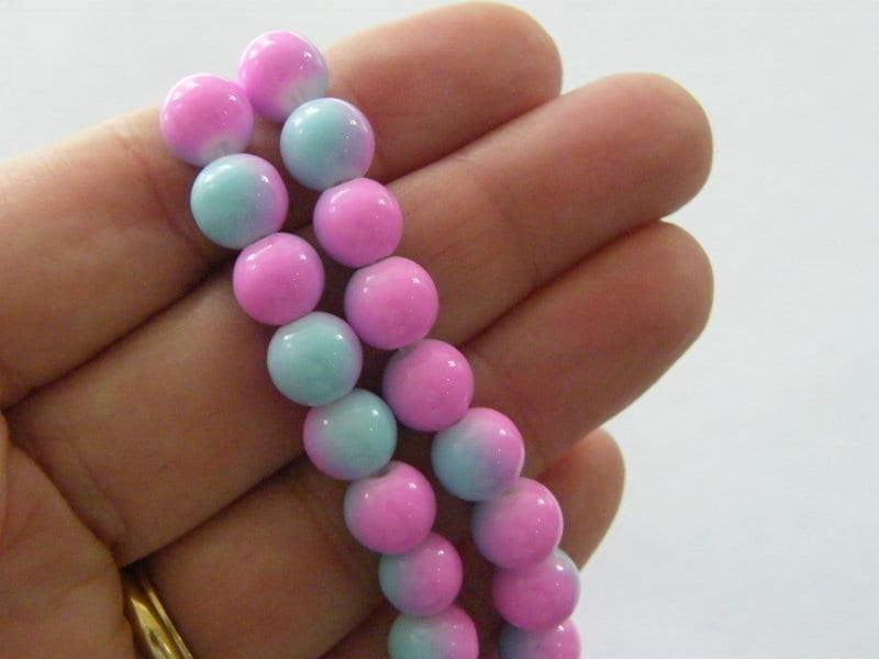 100 Two toned pink and blue beads 8mm glass B134