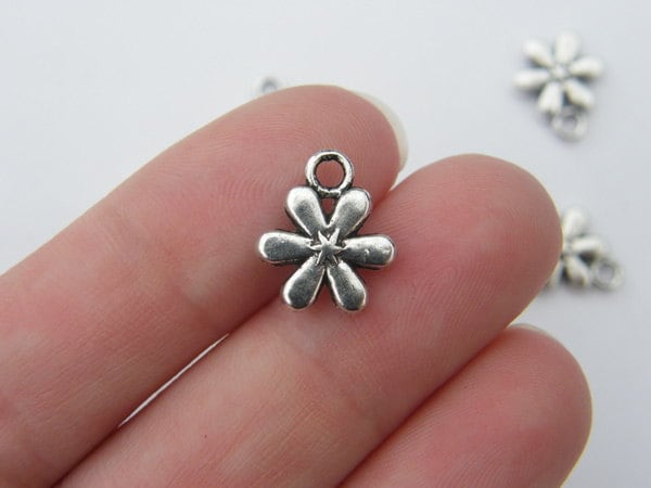 12 Flower charms antique silver tone F4