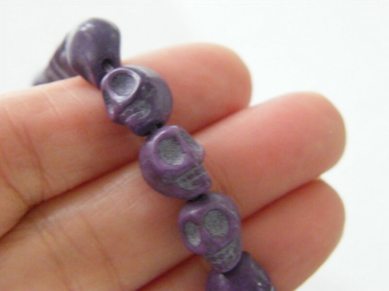 38 Purple skull beads 10 x 8mm SK10