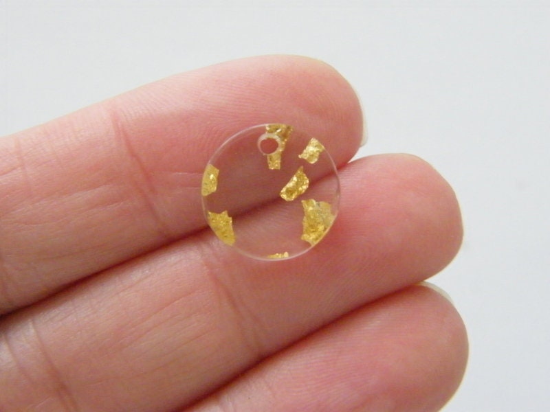 16 Gold foil clear resin charms M212