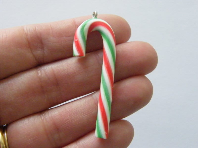 2 Candy cane Christmas charms red and white resin FD595