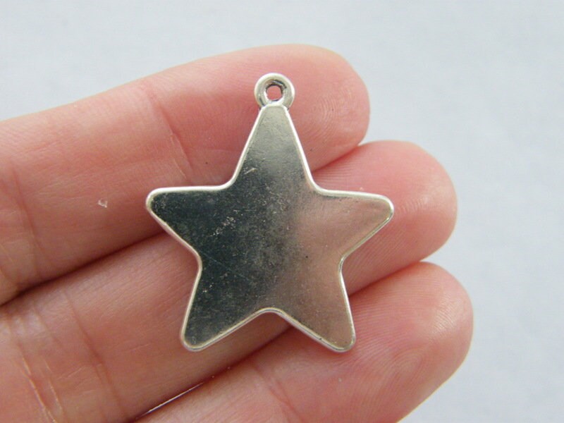 8 Star charms antique silver tone S26
