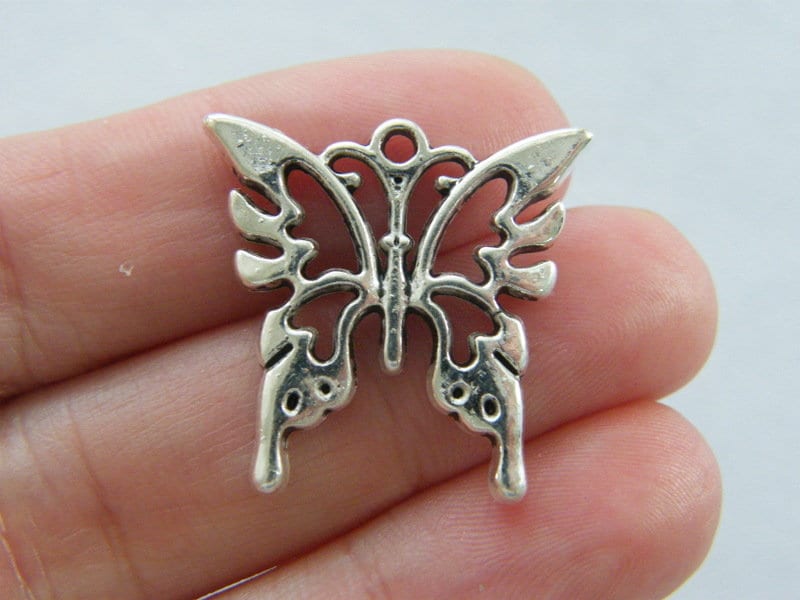 6 Butterfly charms antique silver tone A876
