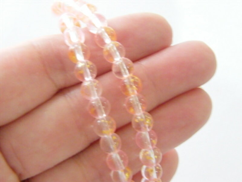 65 Pink golden foil beads 6mm glass B204