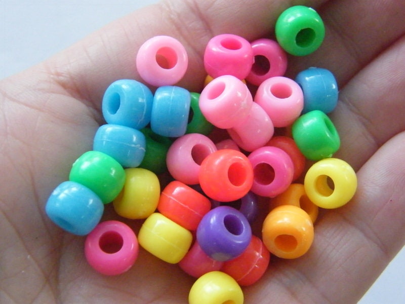 140 Barrel beads random mixed plastic BB593