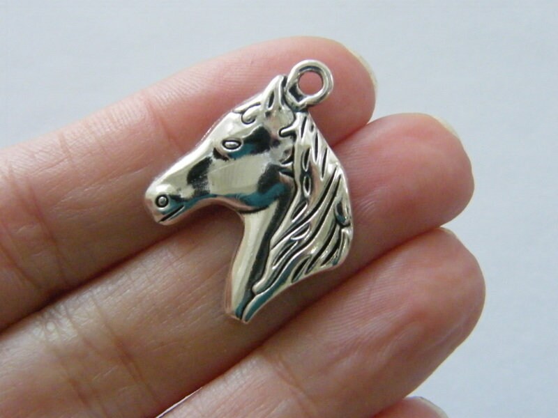 6 Horse charms antique silver tone A956