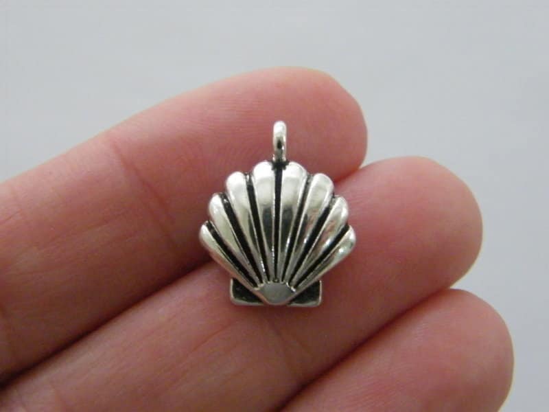 10 Shell charms antique silver tone FF41