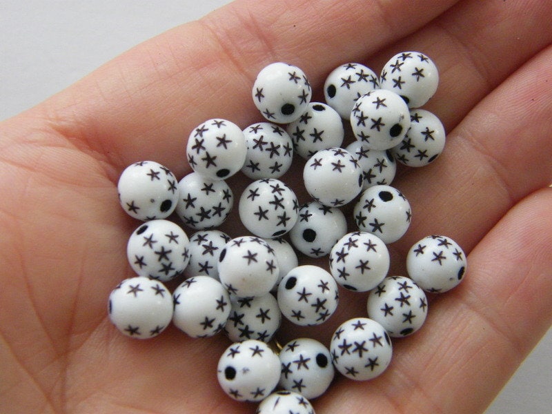 100 White black star beads 8mm acrylic AB741