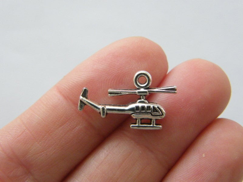 10 Helicopter charms antique silver tone TT12