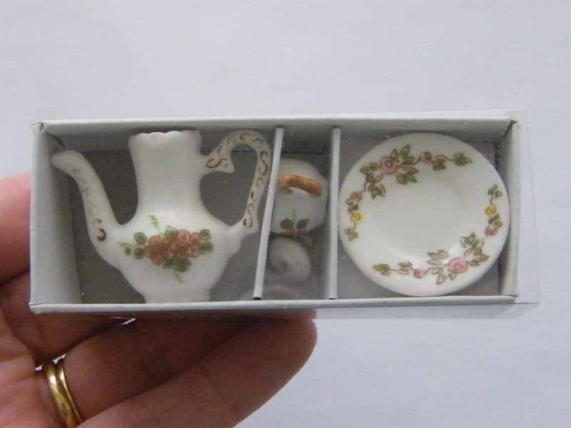 1 White with pink and green flowers and gold trim porcelain tea set