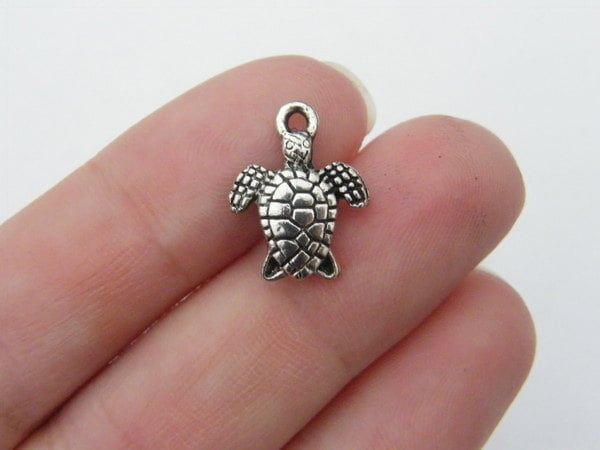 8 Turtle charms tibetan silver FF132