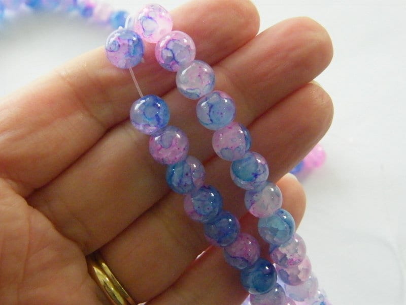 100  Pink blue mottled  beads 8mm glass B226