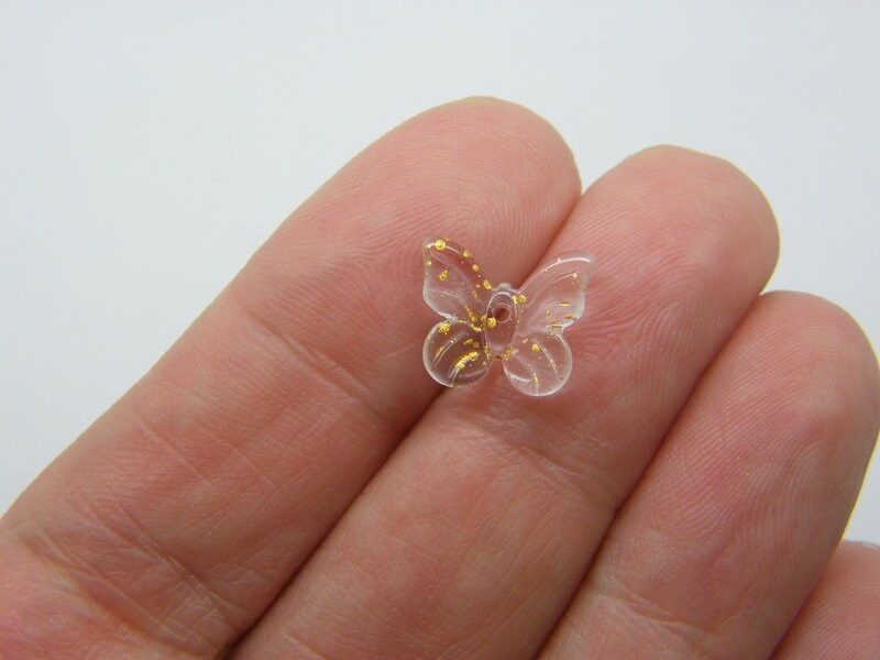 14 Butterfly beads clear with gold dust glass A1190