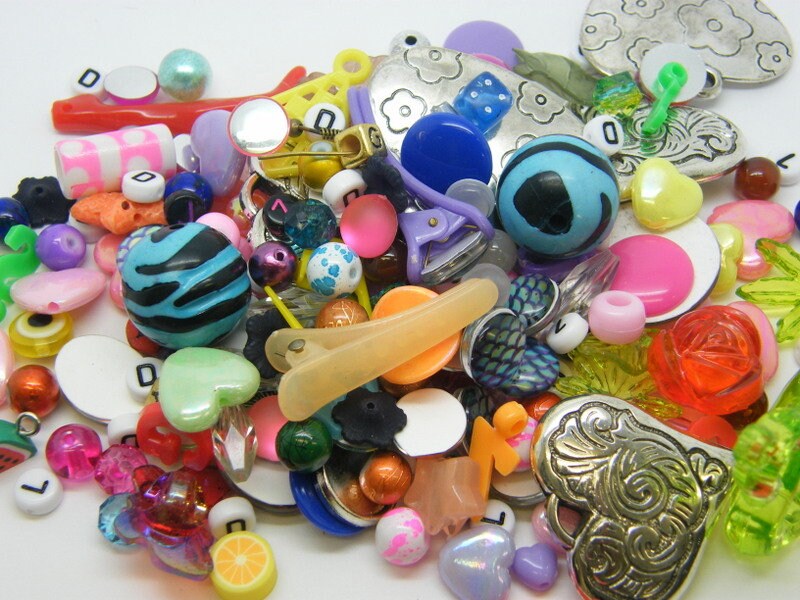 80g Bits and pieces - a random selection of plastic wood and glass charms beads and buttons
