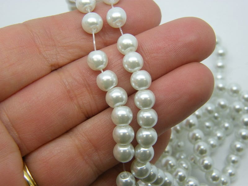 140 White imitation pearl glass 6mm beads B239