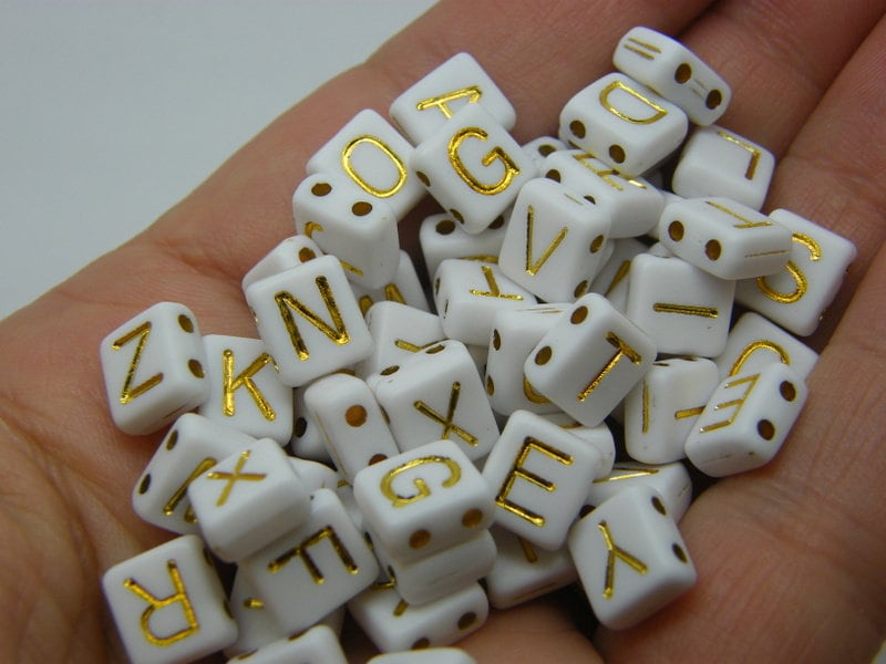 100 Letter beads white and gold RANDOM beads BB766