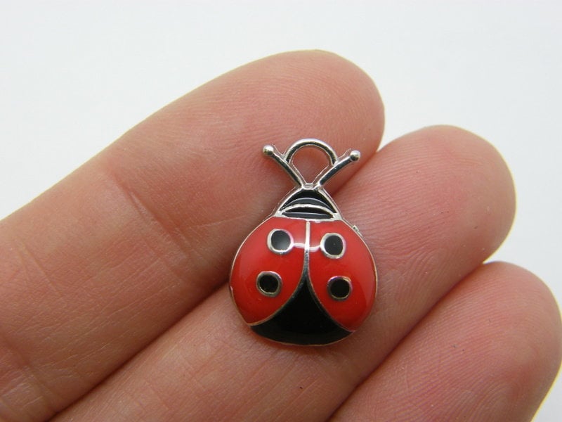 4 Ladybug charms black red  silver tone A343