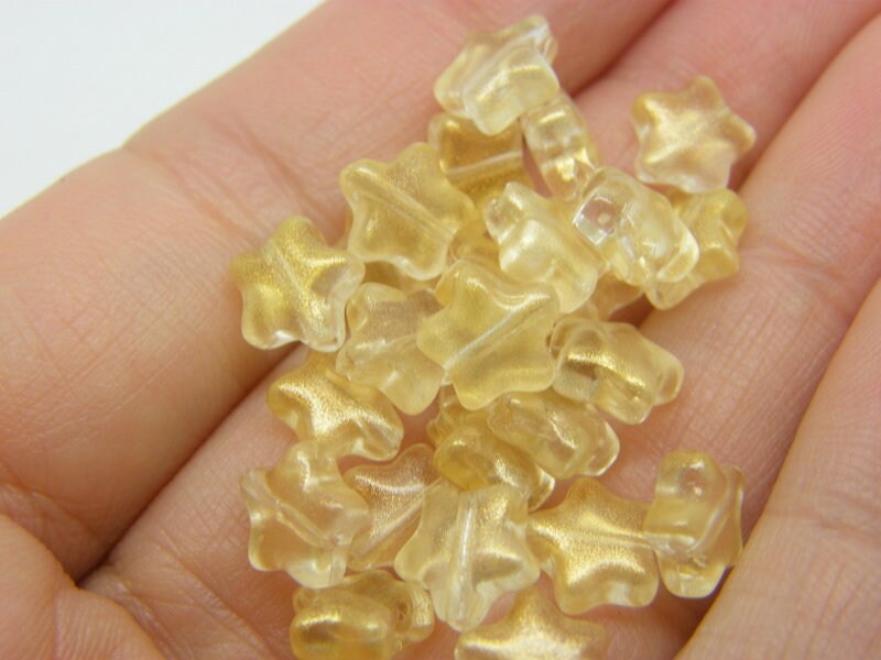 30 Star beads AB gold yellow glass AB331